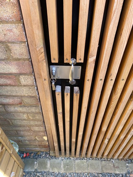 Slatted gate lock with keys installed